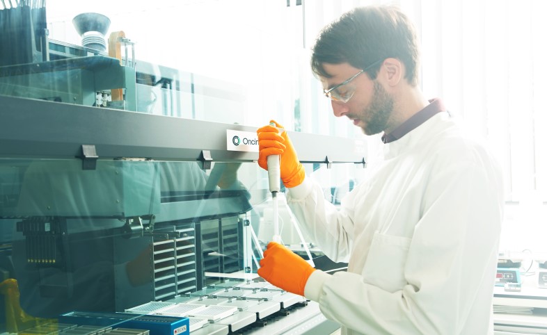 Scientist in an Oncimmune laboratory